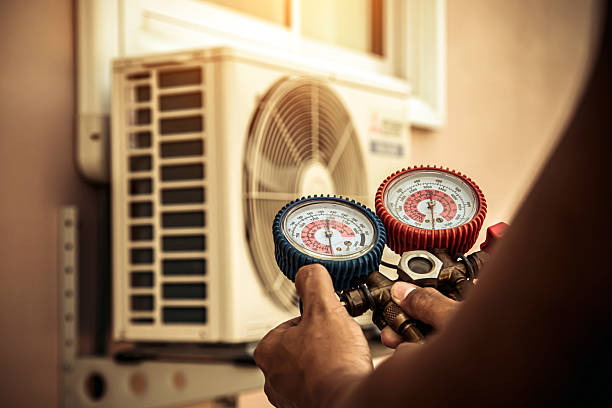 Professional Air Conditioning Service technician working in Grandview, IL